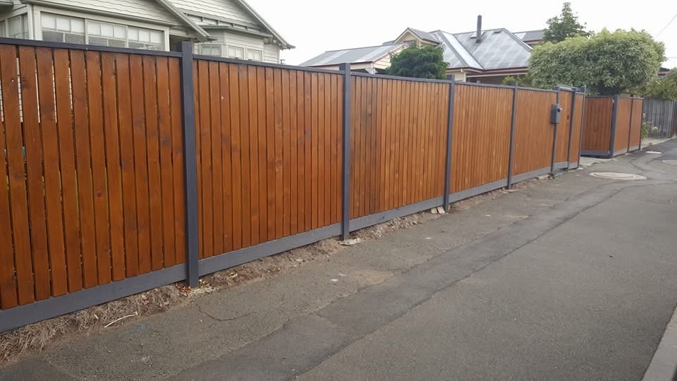Timber slat fence with steel posts along a new development in Southern Tasmania